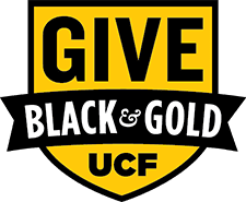 Yellow and black shield-shaped logo with the words "GIVE BLACK & GOLD UCF" in bold letters.